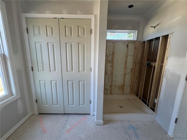 bathroom with baseboards