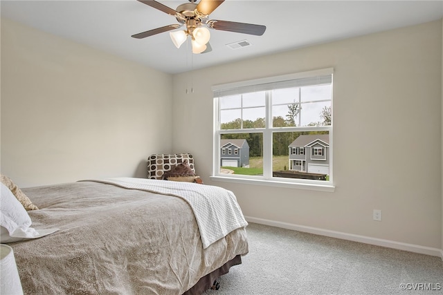 bedroom featuring ceiling fan and carpet flooring