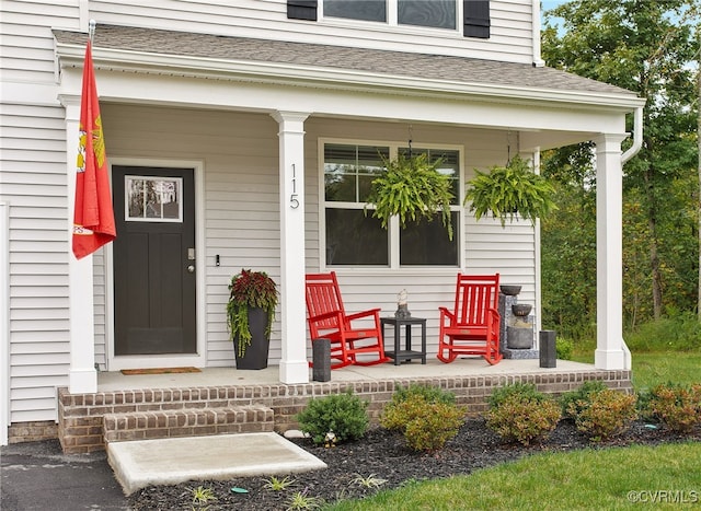 doorway to property featuring a porch