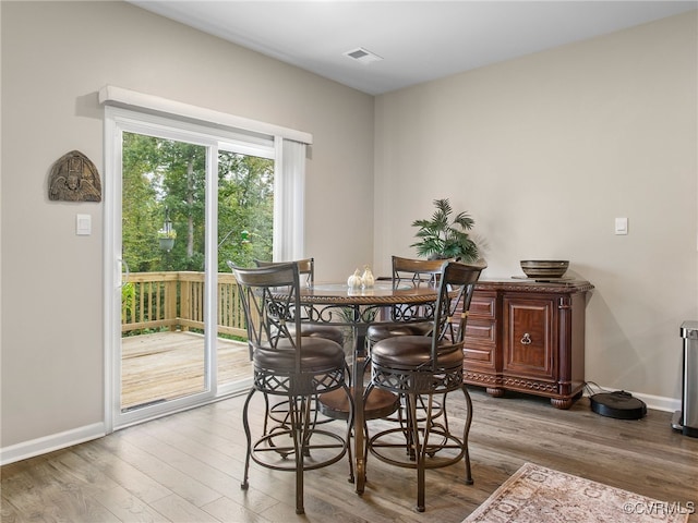 dining room featuring hardwood / wood-style flooring