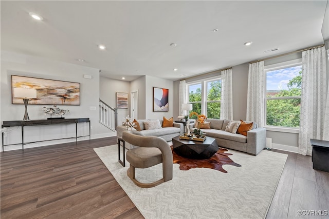 living room featuring dark hardwood / wood-style floors