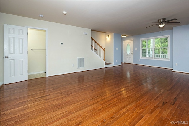 spare room featuring ceiling fan and hardwood / wood-style flooring