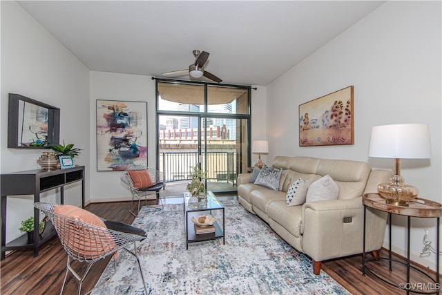 living room with hardwood / wood-style floors and ceiling fan