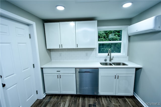 kitchen featuring white cabinets, sink, and dishwasher