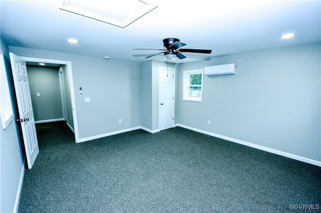 carpeted spare room featuring ceiling fan and a wall unit AC