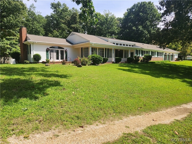 view of front of home with a front yard