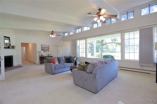 living room featuring a brick fireplace, ceiling fan, light colored carpet, and a baseboard heating unit