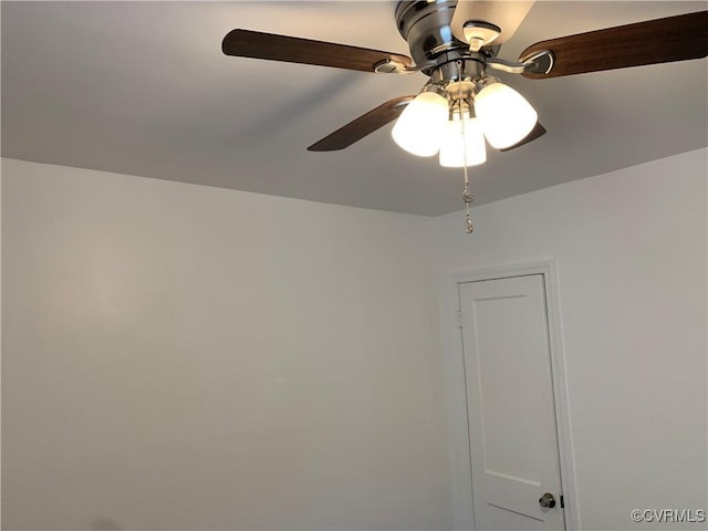 interior details featuring ceiling fan