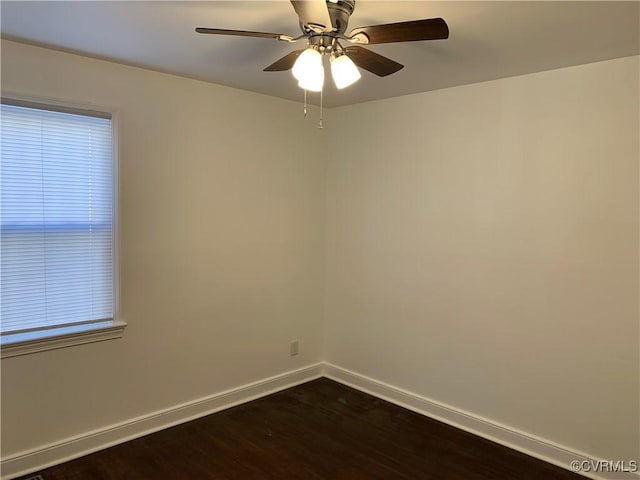 unfurnished room featuring ceiling fan and dark hardwood / wood-style floors