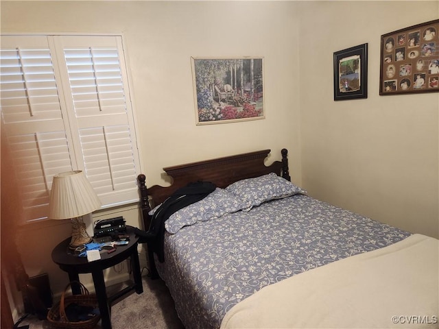 bedroom featuring carpet flooring