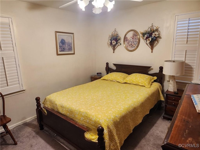 bedroom with baseboards and carpet flooring