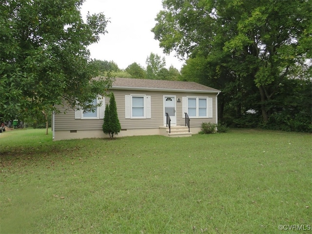 single story home with a front yard