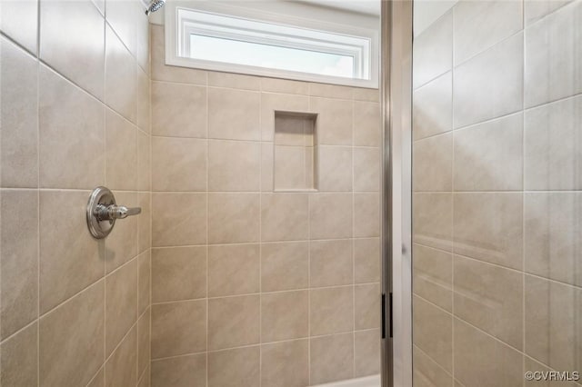 full bathroom featuring a shower stall