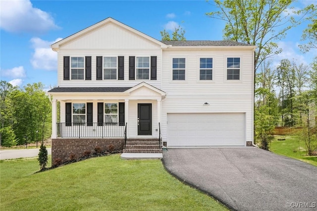 133 Bellevue Ter, King William, VA 23009 - view of front of house with an attached garage, asphalt driveway, covered porch, and a front lawn