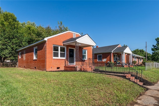 view of front of property featuring a front yard