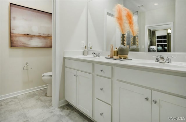 15436 Greenhart Dr, Chesterfield, VA 23832 - full bath with baseboards, toilet, and double vanity
