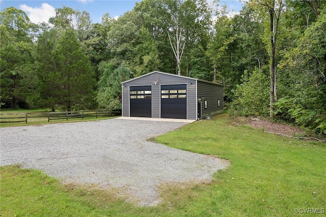 garage featuring a yard