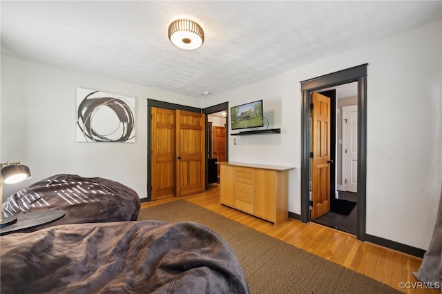 bedroom featuring light wood-type flooring