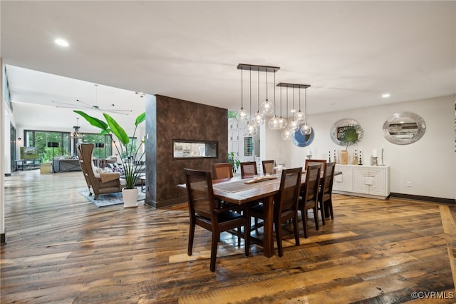 dining room with dark hardwood / wood-style floors