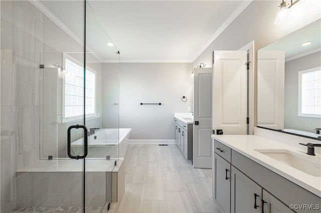 bathroom featuring shower with separate bathtub, ornamental molding, and vanity