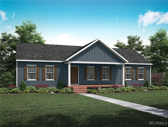 view of front of home with a front yard and covered porch