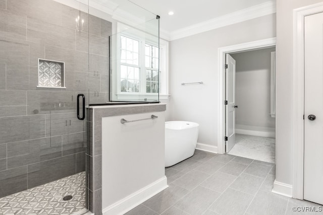 bathroom with independent shower and bath, ornamental molding, and tile patterned floors