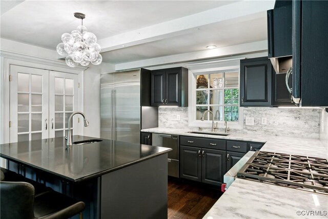 4048 Broad Street Rd, Gum Spring, VA 23065 - kitchen with a sink, decorative backsplash, dark wood-style floors, light countertops, and beam ceiling