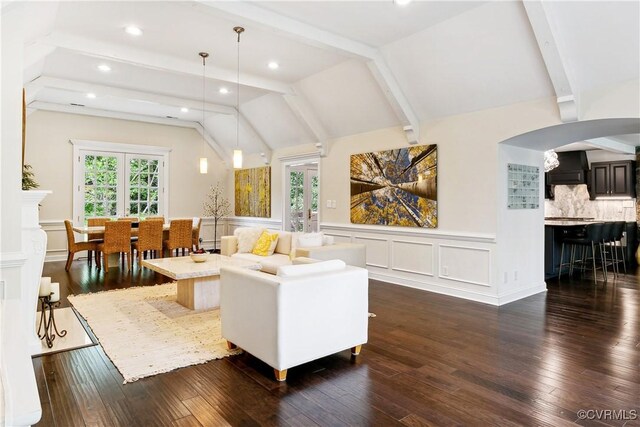 4048 Broad Street Rd, Gum Spring, VA 23065 - living area featuring arched walkways, wainscoting, a decorative wall, dark wood-style flooring, and recessed lighting