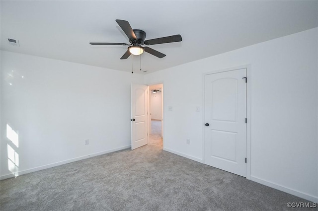 246 American Dr, Ruther Glen, VA 22546 - unfurnished bedroom featuring carpet floors and a ceiling fan