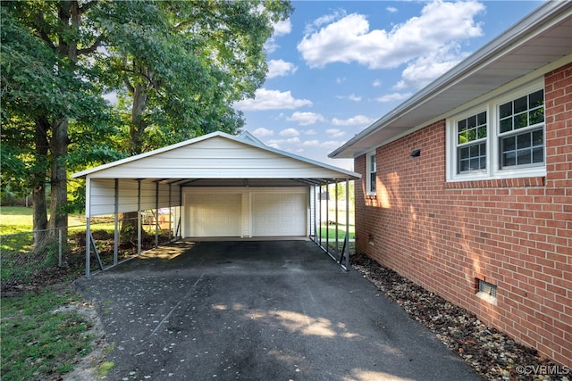 garage with a carport