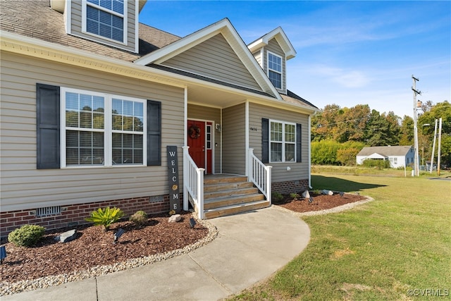 view of front of home featuring a front yard