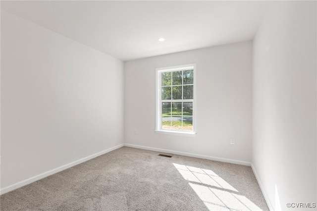 unfurnished room featuring carpet floors