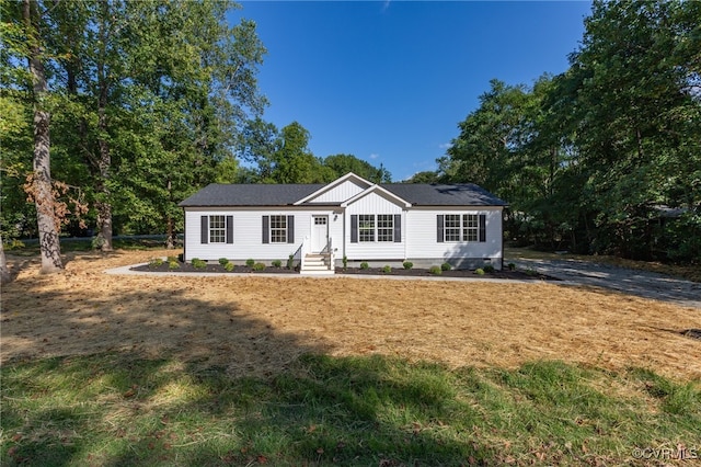 ranch-style house with a front yard