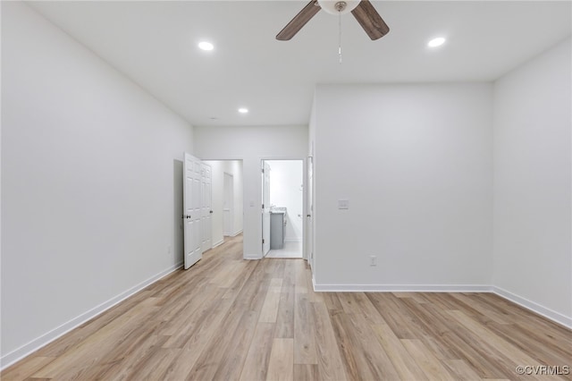 unfurnished room with light hardwood / wood-style floors and ceiling fan