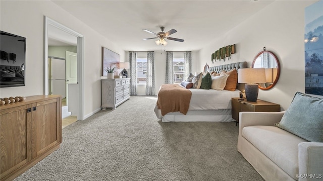 bedroom with ceiling fan and light colored carpet