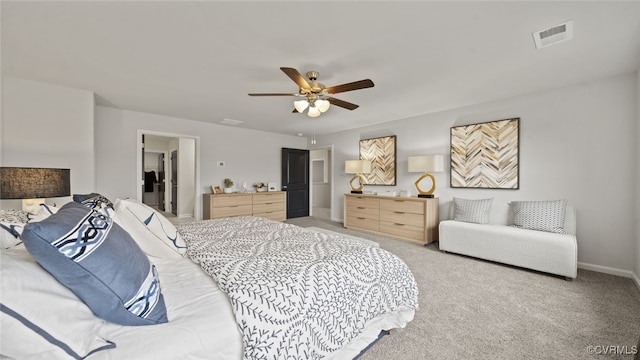 bedroom featuring light carpet and ceiling fan