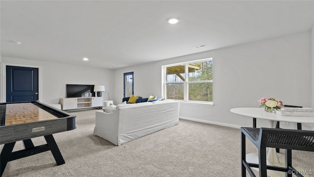 living room with light colored carpet