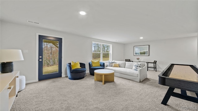 living room featuring light colored carpet