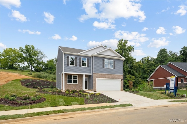 view of front facade with a garage and a front yard