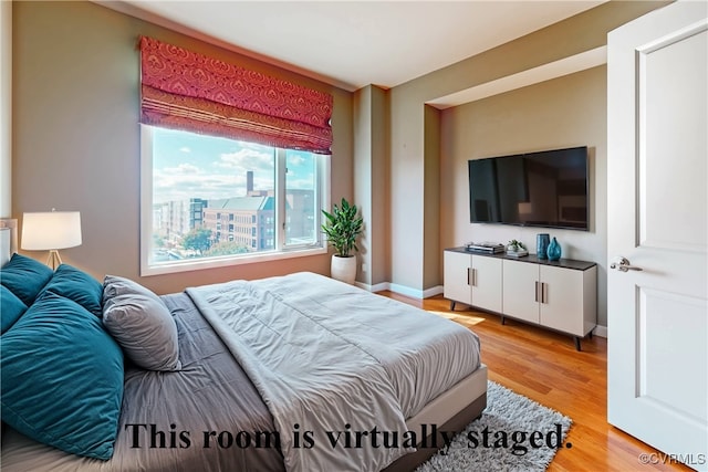 bedroom featuring light hardwood / wood-style flooring