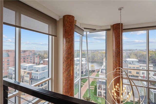 room details with a water view and a chandelier