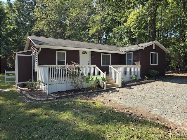 ranch-style home with covered porch