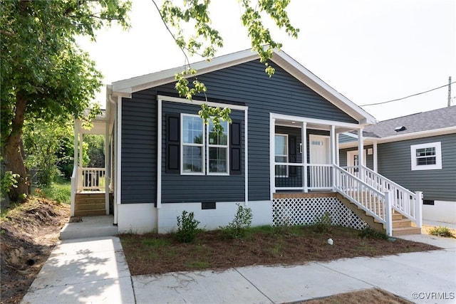 751 Jones St, Petersburg, VA 23803 - view of front facade featuring covered porch and crawl space