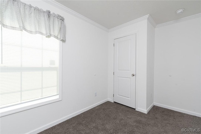 751 Jones St, Petersburg, VA 23803 - empty room with dark colored carpet, crown molding, and a smoke detector