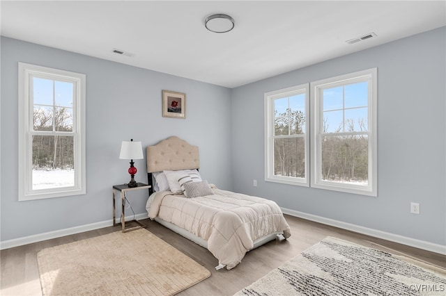 bedroom featuring light wood-type flooring