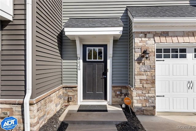 entrance to property with a garage