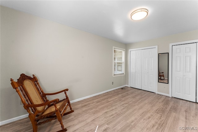 sitting room with light wood-type flooring