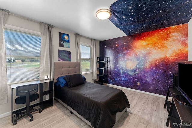 bedroom featuring hardwood / wood-style flooring