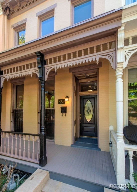 doorway to property with a porch