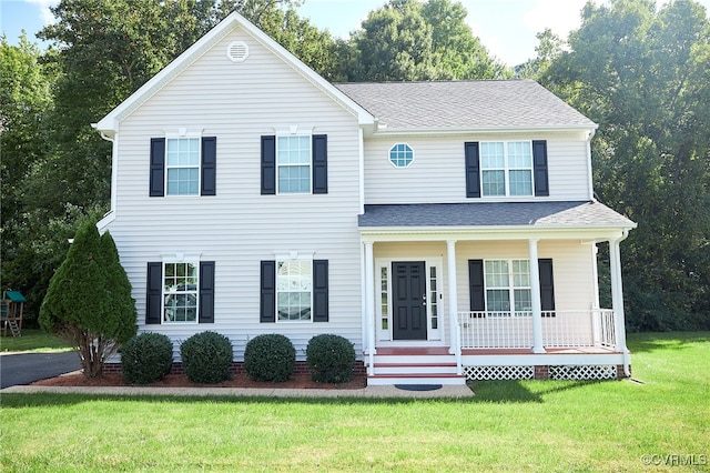 view of front of home featuring a porch and a front lawn